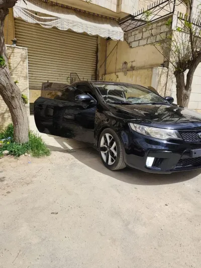 كيا فورتي 2011 - صورة 10